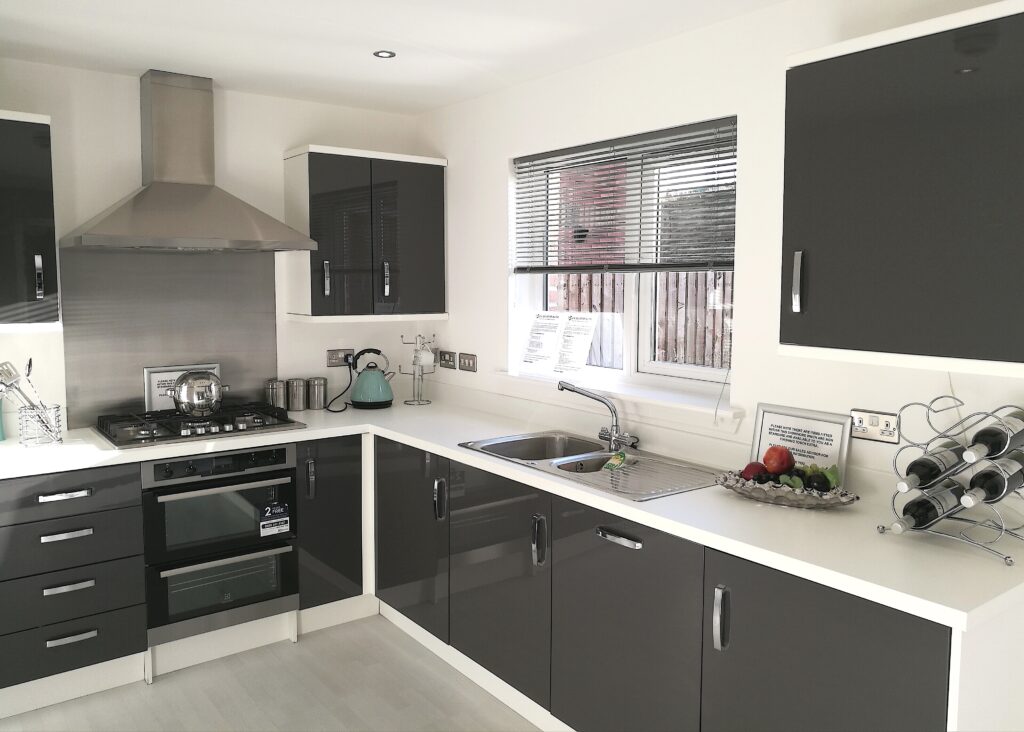 White and grey gloss kitchen in a Show Home