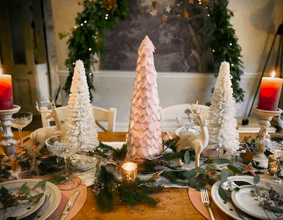 Pink and white feather cones in a festive tablescape