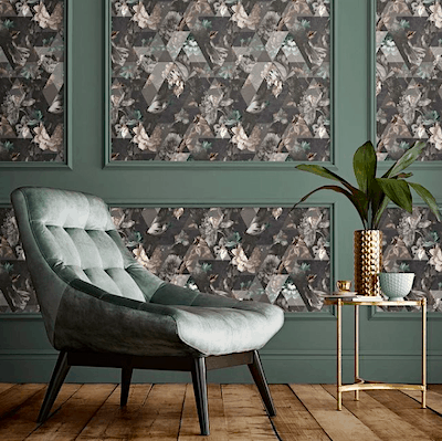 Green room with dark floral wallpaper