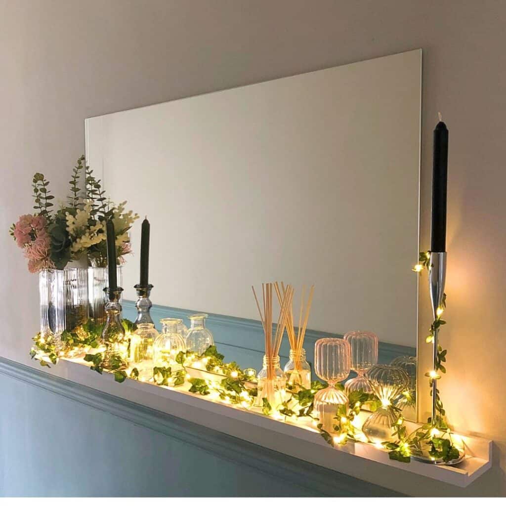 hallway decor with mirror, shelf and fairy lights