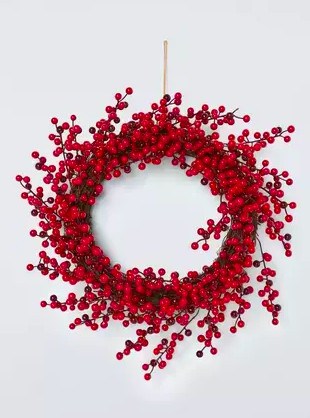 Red Berry Wreath. This simple twig wreath is festooned with hundreds of berries in bright and deep shades of red.