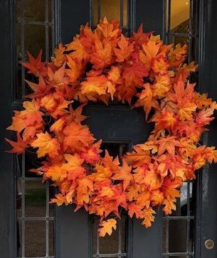 large orange autumnal with leave foliage, luxury autumnal wreath