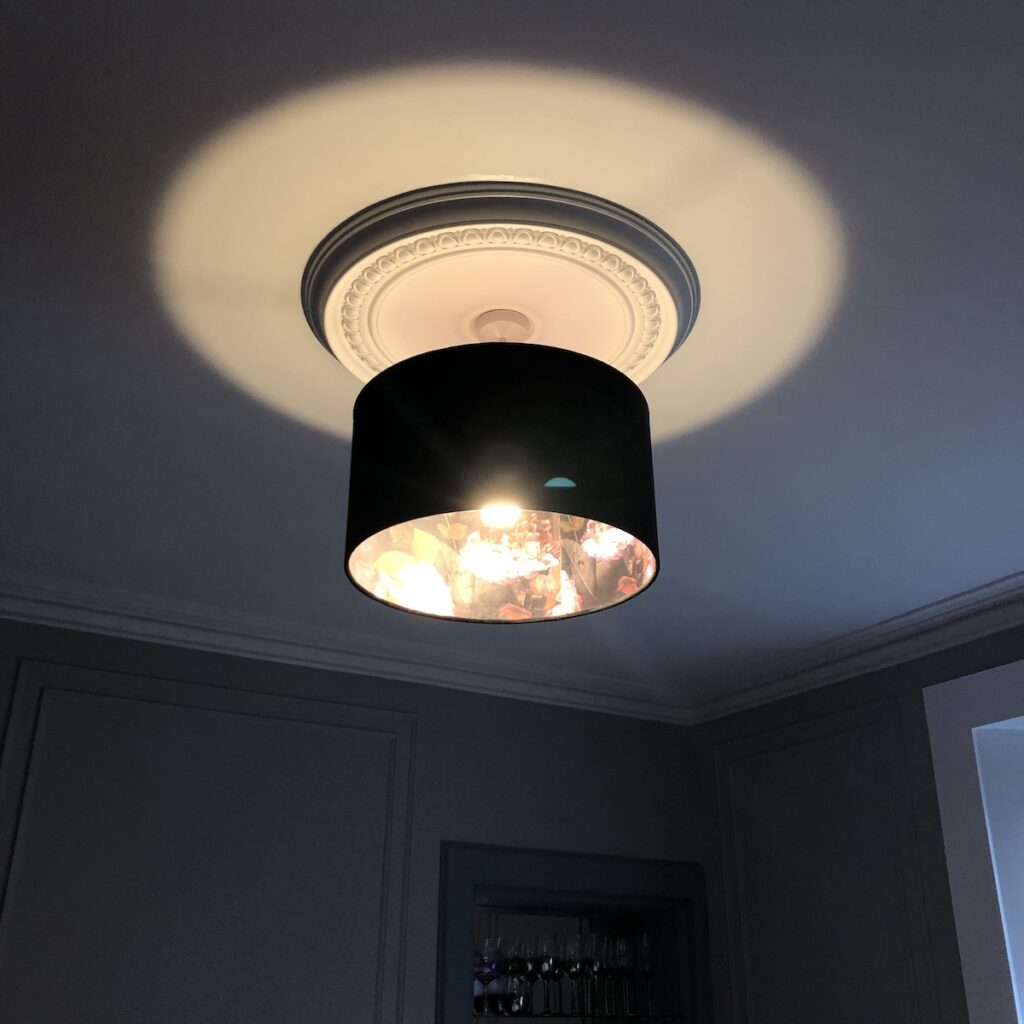 Ceiling rose finished with a black velvet ceiling shade with velvet floral inside added